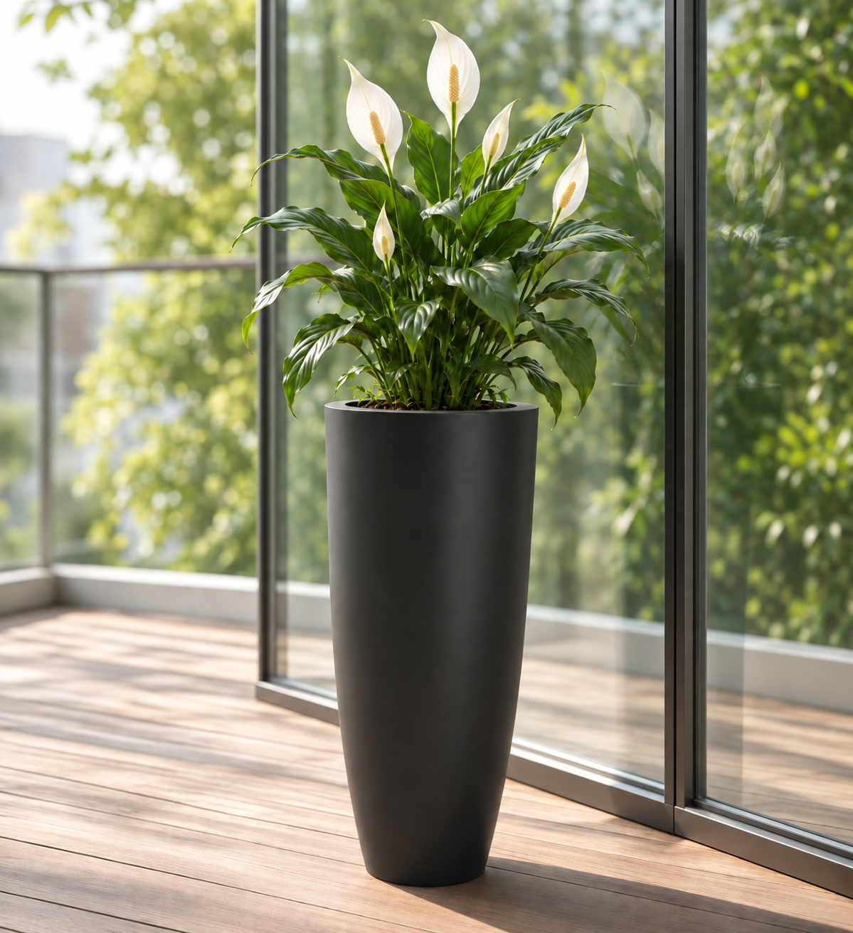 Taper Architectural Planter styled on a covered patio with greenery and warm neutral outdoor furniture